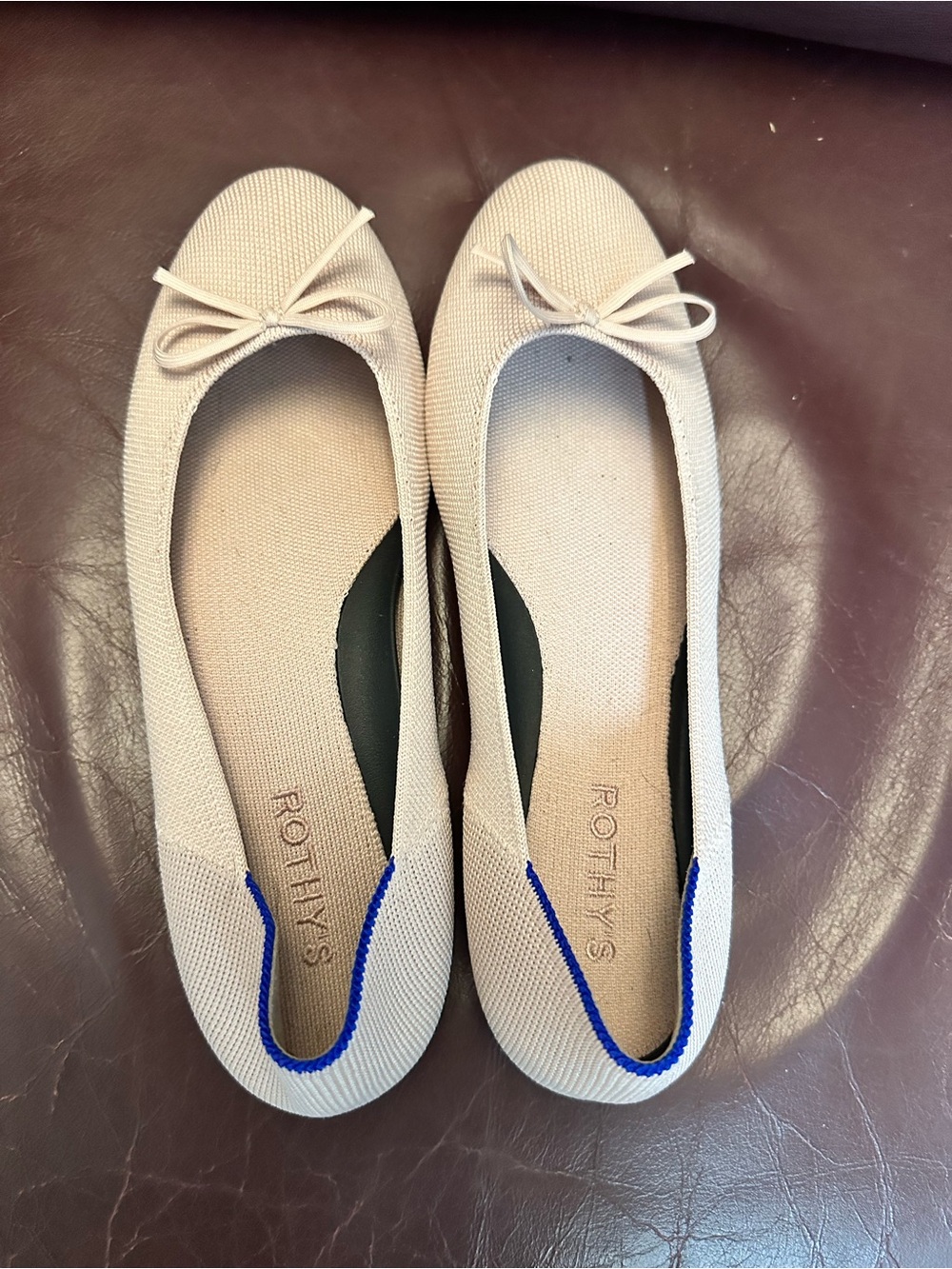 Rothy's Light Pink Knit Ballet Flats with Blue Heel Trim and Bow